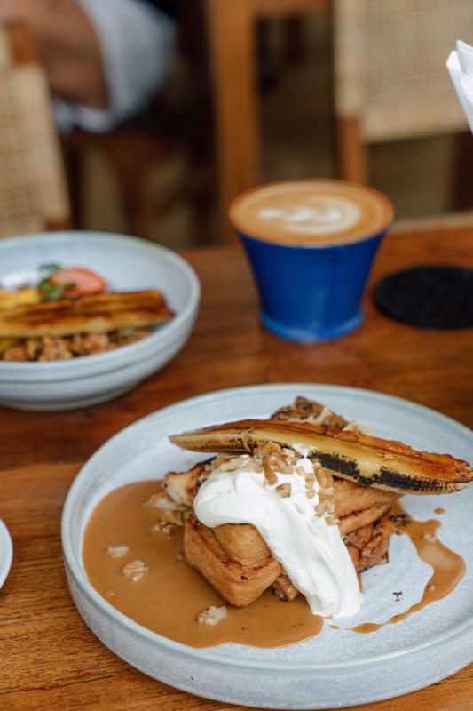 Decadent brioche French toast with caramelised banana and whipped cream